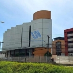 Prédio Comercial Prédio com 3.164m² de área total, 07 pavimentos e 2.055m² de salas e loja.