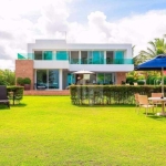 PÉ NA AREIA - Casa Frente Mar a venda em Guarajuba - Litoral Norte da Bahia. Condomínio.