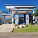 Casa com 4 dormitórios e 2 suítes à venda, por R$ 2.900.000 - Condomínio Marítimo - Tramandaí/RS