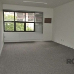 SALA COMERCIAL NO BAIRRO AUXILIADORA!!!! Excelente Sala comercial de 34,45 m² privativos, lavabo, frente, posição solar oeste, depósito no subsolo. Prédio com fachada em Granito, próximo Av Plinio Bra