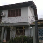 Casa 4 dormitórios, suíte, sala dois ambientes, lareira, 2 banheiros, sacada, cozinha ampla, despensa, garagem para 2 carros cobertas e 1 descoberta. Perto da Av.teresópolis, comércios, transportes e 