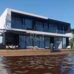 Mansão beira lago a venda no Condom Malibu Beach Residence em Xangri-lá, decorada por Arquiteto. já com os moveis e eletro=domesticos incluidos&lt;BR&gt;São 05 suítes amplas, sendo 02 térreas e 01 más