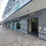 Excelente sala comercial com 26,81 m2 de área privativa ao lado do Mc Donalds, composta por ampla sala com 1 divisória e 1 banheiro. &lt;BR&gt;Condomínio muito organizado e seguro.