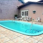 Casa com 3 dormitórios, 3 banheiros, 3 vagas. Casa de esquina com dois pisos, sacada com piscina e garagem para 3 carros. São 3 quartos uma suíte com closet 2 áreas de pátio com piscina, sala de estar