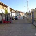 Terreno em condomínio, com metade já construído, com sobrados padrão. O mesmo possui lojas na frente, possui vista para o terra ville.