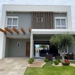 Conheça esta espetacular casa à venda no Condomínio Blue, em Xangri-Lá. Com 185 m² de área privativa, esta residência é perfeita para quem busca conforto e sofisticação. Situada em um bairro tranquilo