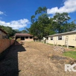 Terreno para compra em Porto Alegre/RS | Medindo 360m² com construção não finalizada ao fundo e terreno plaino. Próximo à avenida, ponto de ônibus, supermercados e farmácias. &lt;BR&gt;Aceita carro, A