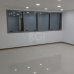 Sala Comercial bairro Menino Deus, piso de porcelanato. Andar alto e vista para o Guaíba, excelente investimento. &lt;BR&gt;O bairro Menino Deus em Porto Alegre está próximo aos bairros Centro Históri