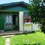 Casa térrea, loteamento Santa Izabel, no bairro Harmonia, em Canoas. Casa com 02 dormitórios, sala, cozinha, banheiro social e área de serviço.&lt;BR&gt;Pátio frente e fundos, com amplo terreno, todo 