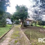 Mini sítio à venda localizado na Colônia de Itapuã | Lindo sítio com 3 dormitórios, sala, cozinha, 2 banheiros e área ampla. Galpão de alvenaria com churrasqueira e fogão campeiro, além de estrutura p