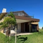 Casa Nova em Passo de Torres , localizada no Cond Vilas do Mar . Cond. Fechado de alto padrão com infraestrutura completa e estilo proprio &lt;BR&gt;O unico do Sul com  acesso ao rio mampituba que ofe