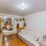 Excelente oportunidade para quem busca espaço e valorização! O imóvel conta com uma ampla casa de alvenaria nos fundos, com 2 dormitórios, living para 2 ambientes, copa/cozinha, banheiro social, área 