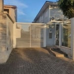 Excelente sobrado semi mobiliado a venda em Canoas, bairro N.Sra. das Graças, em condomínio fechado com apenas 5 casas. O imóvel possui 2 dormitórios, 2 banheiros, espaço gourmet externo, 2 vagas de g