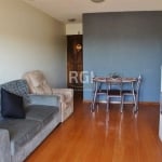 Apartamento de 2 dormitórios no bairro Ouro Branco em Novo Hamburgo, sala de estar e jantar ar condicionado na sala e quarto do casal, , banheiro social, sacada com vista e com tela de proteção, cozin