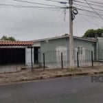 Casa à venda em Canoas, com 115m² de área privativa e 150m² de área total. Possui 2 dormitórios, 2 banheiros sociais e 2 vagas de garagem. Localizada na Rua Júlio Pereira de Souza, no bairro Estância 