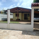 Casa em madeira dupla a venda em Canoas, no bairro Fátima. Conta com 2 dormitórios, sala, cozinha, banheiro, garagem coberta para 3 carros. O amplo terreno possui 386m². Proprietário analisa casa, ter