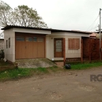 Casa com lage e estrutura para segundo piso, composta de sala, banheiro social , cozinha americana e um dormitório, terreno murado e grades. localização na Rua Herceu Farins Barbosa.  próximo a Estrad