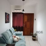 Apartamento 2 dormitórios, bem iluminado e arejado e 1 vaga de garagem escriturada. Conta ainda com, banheiro social, sala p/2 ambientes: estar/jantar, cozinha e área de serviço separada. &lt;BR&gt;Ex