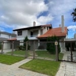 Casa em Atlântida&lt;BR&gt;Próxima ao Caburé Descubra esta magnífica casa localizada na Rua Tipuana, no coração do bairro Atlântida, em Xangri-Lá. Com uma área privativa de 300 m², este imóvel oferece