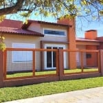 CASA TERREA NOVA 2 Dormitórios Praia Arroio Teixeira, 1 suite, 88,93m²  &lt;BR&gt;&lt;BR&gt;Casa nova, de 2 dormitórios, sendo um suíte, com excelente padrão de acabamento , com pé direito duplo, cozi