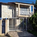 Sobrado com 3 dormitórios, suíte, churrasqueira, lareira, no Jardim Algarve em Alvorada - RS.&lt;BR&gt;&lt;BR&gt;Excelente sobrado , no primeiro pavimento conta com a sala de estar e jantar , 1 dormit