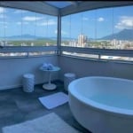 Vendo esse belíssimo Apartamento em Condomínio de Alto Padrão, localizado no Bairro Pagani, ao lado do Shopping Via Catarina, A vista para o oceano e para as montanhas são de tirar o folego, Proporcio