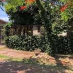 Vendo terreno 30x15. &lt;BR&gt;450 m2 com duas casas no pátio. Terreno amplo e bem localizado.&lt;BR&gt;Bairro Cristo Rei - São Leopoldo