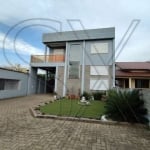 Excelente casa com 216m² terreno medindo 11 x40, em Gravataí no Bairro Parque dos Anjos , com uma ótima localização, próximo   a Instituição de Ensino Bradesco , supermercados, farmácias . A casa é co