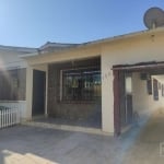 Casa de 3 dormitórios no centro da Santa Isabel, Viamão, living amplo, sala estar, cozinha espaçosa, lavanderia, pátio com piscina, ampla garagem lateral ate 4 carros, nos fundos salão festas com chur