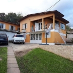 Casa com 4 Dormitórios, 2 churrasqueiras, Quiosque, 4 banheiros, 2 suítes, 4 salas, jardim de inverno, 1 cozinha, Piscina, local excelente para investimento, a cinco minutos do Hipermercado  Big Zona 