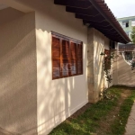 Casa sobrado de 4 dormitórios, sendo 1 suíte, no bairro Intercap. Living para 3 ambientes, cozinha ampla, banheiro social, edícula com salão de festas e churrasqueira, garagem fechada para 1 carro e e