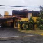 Casa para locação no Residencial Isaura, Pq. Campolim, com 6 quartos, sendo 5 suítes e piscina, valor R$ 10.000,00.