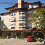 Lindo apartamento , dois dormitórios, sendo um suíte, living estendido, churrasqueira, lareira, lavanderia seoparada, mobiliado, piso vinílico e porcelanato, duas vagas cobertas e individuais, próximo