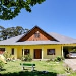 Ótima casa sobrado, no bairro Cajú, em Nova Santa Rita. Casa com 4 dormitórios sendo uma suíte, 1 banheiro social, salas e cozinha ambiente aberto.&lt;BR&gt;Garagem para 2 carros com churrasqueira&lt;