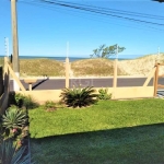 Casa na praia com Dormitórios: 4, Banheiros: 2, Garagem: 3 vagas (1 coberta),Ar Condicionado: 4 (Quartos).&lt;BR&gt;³Casa de frente ao mar e aceita financiamento bancário´.&lt;BR&gt;Aceita Propostas: 