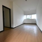 - SALA COMERCIAL - Imóvel com 38,06 m² , dividida em 2 ambientes e 1 lavabo, posição de frente, piso laminado, 3 andar (4 pavimento) com elevadores, 1 vaga de box provativa N. 72 ( o valor do box é se