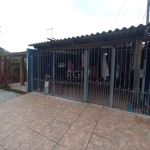 Ótima casa no bairro Hípica, com 3 dormitórios, amplo living, cozinha, espaço gourtmet com churrasqueira, lavanderia em espaço próprio, banheiro social com box,  piso porcelanato, vaga de garagem cobe