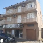 Prédio com 3 pavimentos, possui uma loja, 2 apartamentos e 1 garagem, segue as descrições:&lt;BR&gt;Térreo: Loja com 70m², garagem de 30m² (2 vagas) e nos fundos possui uma meia água de 1 dormitório, 