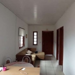 Casa à venda com 3 dormitórios no bairro Santa Maria Goretti, banheiro social, living, churrasqueira com área coberta, lavabo na parte externa, pátio, cozinha, área de serviço, vaga de garagem coberta