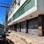 DEPÓSITO/PAVILHÃO/LOJÃO COM 1300 M2, NA AV. BENTO GONÇALVES. &lt;BR&gt;Possui área privativa de 1300m²,  sendo a loja com 980m² e o primeiro andar com 320m². &lt;BR&gt;O primeiro andar está alugado pa