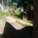 Terreno com 3 casas no bairro Nonoai, Porto Alegre/RS  &lt;BR&gt; &lt;BR&gt;Este terreno de 567,92m² apresenta três casas independentes, cada uma com um dormitório, sala de estar, cozinha e banheiro, 