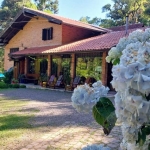 Magnífica residência em São Francisco de Paula, de 5 suítes, lavabo e demais dependências,  terreno com 1998m² com mais uma cabana, muito paisagismo, piscina com aquecimento solar, a 200m do lago São 