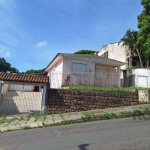 Terreno com casa com 3 quartos, vaga de garagem, no bairro Ipanema, Porto Alegre/RS