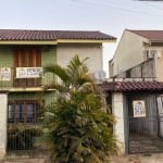 Casa à venda na Rua Martinho Lutero, localizada no bairro Harmonia em Canoas, RS.