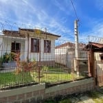 Quatro casas no mesmo terreno. Casa da frente, dois dormitórios, duas salas, banho, cozinha, ampla área com churrasqueira, terraço, garagem nos fundos.&lt;BR&gt;Segunda, um dor, sala, banho cozinha.&l