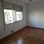 OPORTUNIDADE - no coração do bairro Rio Branco       &lt;BR&gt;    &lt;BR&gt;Excelente apartamento térreo, desocupado, bem iluminado, dom dois dormitórios, lindo piso parquet, living estar e jantar, c