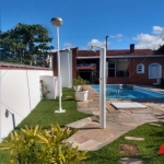 casa peruíbe, balneário oasis, 3 suítes, 2 salas, cozinha , 7 vagas, edícula com 1 quarto. sala. cozinha, banheiro, varanda, piscina