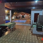 casa peruíbe, balneário oasis, 3 suítes, 2 salas, cozinha , 7 vagas, edícula com 1 quarto. sala. cozinha, banheiro, varanda, piscina