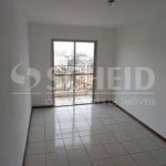 Apartamento no Jardim Prudência, 52m², 2 quartos, cozinha com armários e varanda.