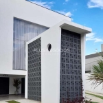 Casa de Condomínio Exclusiva: Sobrado Moderno com 3 Suítes, Design Sofisticado e Natureza Preservad